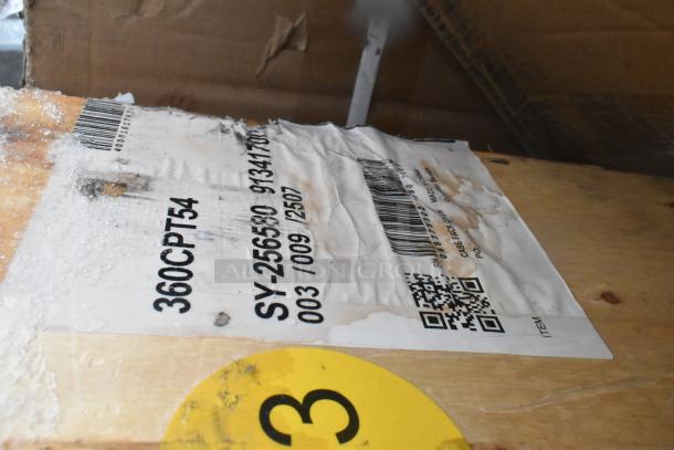 Auction lot with new scratch and dent items, including shelves and tabletop. Visible label: "360CPT54," barcode, and QR code.