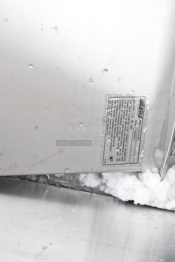 Metal panel with manufacturer label. Features include stainless steel construction and NSF certification. Visible markings.