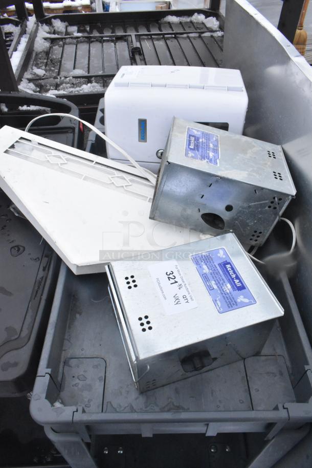 Four items including metal mouse traps, bug zapper, and Ecolab water booster in used condition. Labels indicate Ketch-All brand and model details.