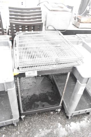 Black 2-tier cart on commercial casters with wire racks included, showing label "327 Qty 1". Used condition.