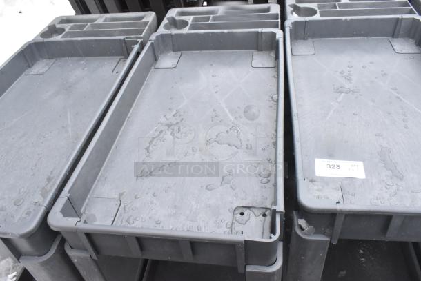 2 Poly 2 Tier Carts on commercial casters, gray, used condition, some surface wear, item tag "328 X 1" visible.