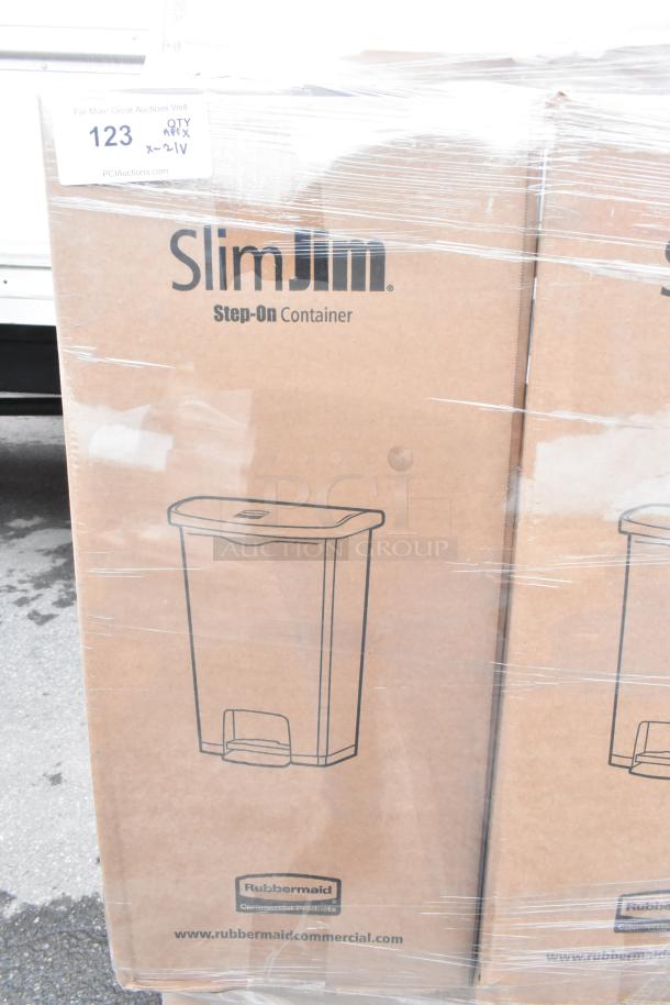 Cardboard box containing a Rubbermaid 1883458 Slim Jim Step-On Trash Can, 52 Qt, brand new, wrapped in plastic.