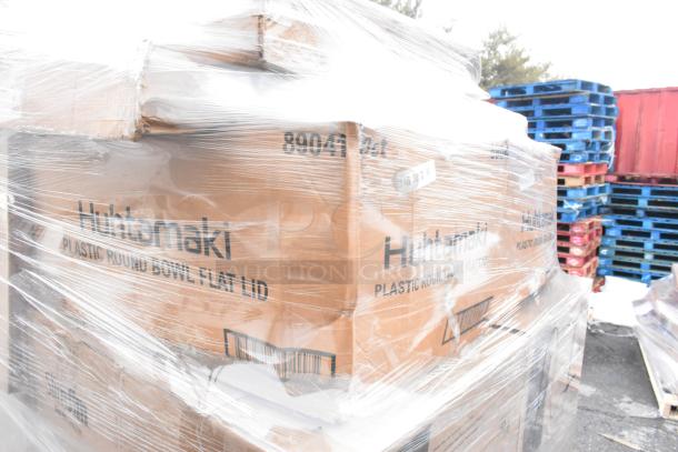 Pallet with Huhtamaki plastic round bowl flat lids in sealed boxes, model 89041. Scratch and dent items wrapped in plastic.