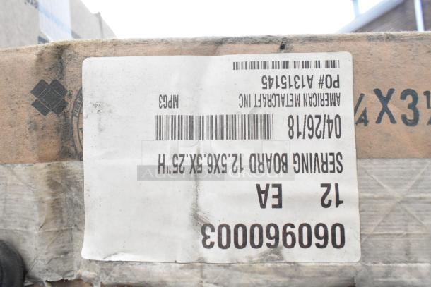 Label on a cardboard box from American Metalcraft Inc, indicating a 12-pack of serving boards, size 12.5x6.9x.25 inches, item code MP63.