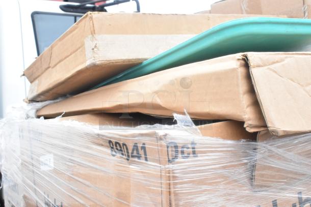 21 brand new scratch and dent items wrapped in plastic, visible Huhtamaki 89041 marking, including Rubbermaid trash can.