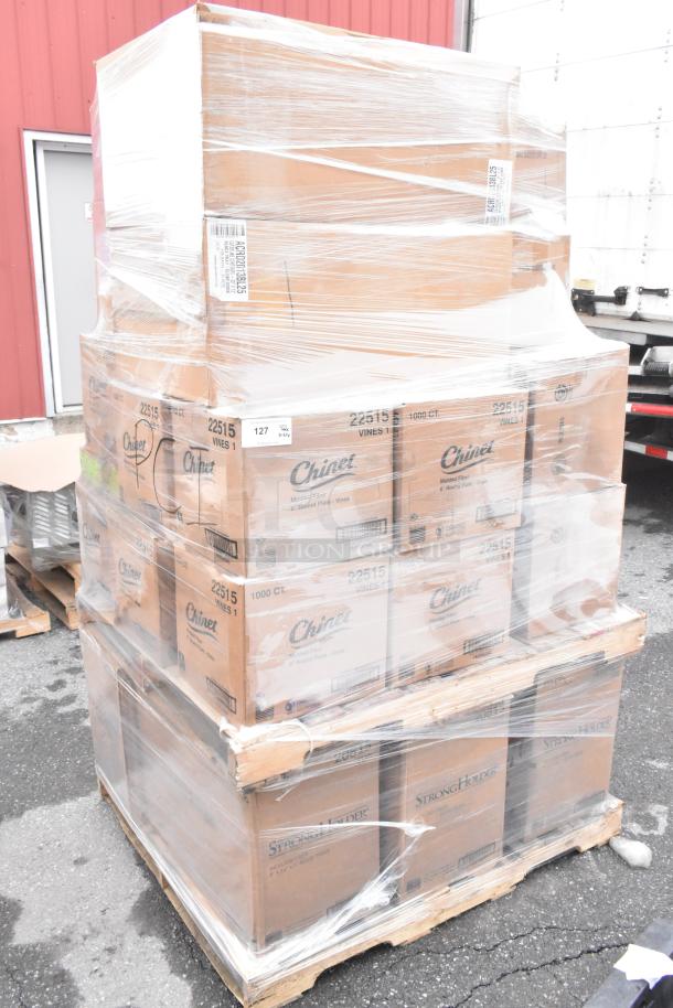 Pallet of 37 boxes including Chinet StrongHolder food trays and Vines plates, brand new, wrapped for auction.