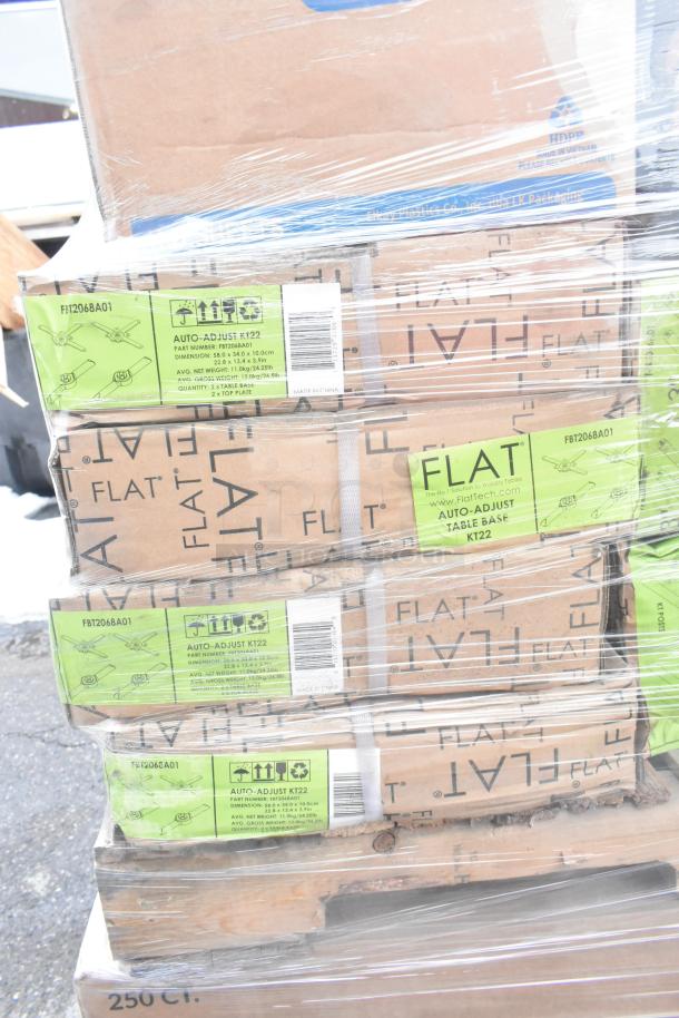 37 boxes of Chinet food trays and plates, new condition, labels show Auto Adjust KT22 specs, wrapped on a pallet.