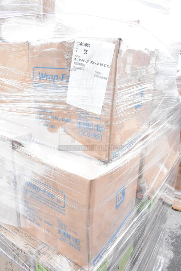 Pallet of wrapped boxes labeled "Wrap-Eze" and "DELI WRAP-EZE POP-UP SHEET CL," indicating packaged food items.