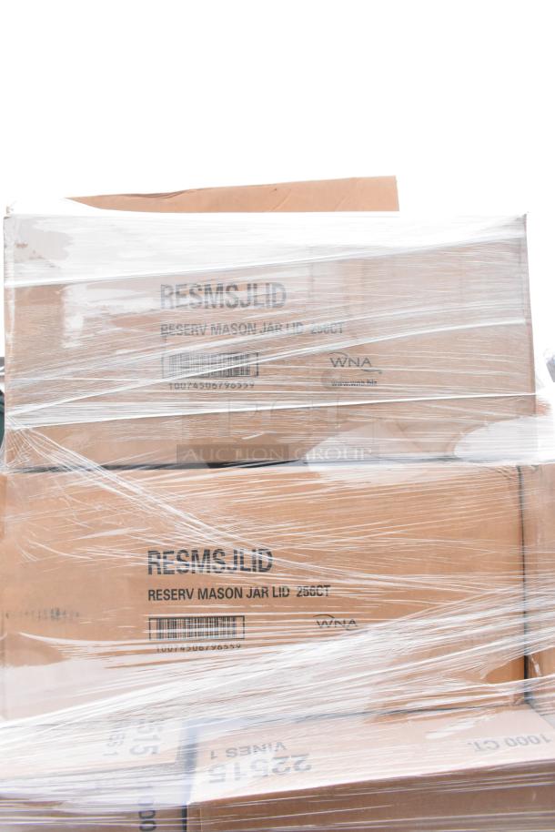 37 brand new boxes of Chinet food trays, plates, and KT posts, wrapped and labeled for auction. Some labeled "Reserv Mason Jar Lid".