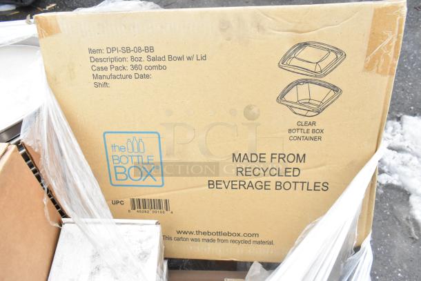 Box labeled "The Bottle Box" for 8oz salad bowl w/ lid, made from recycled materials. Contains new clamshells and pans.