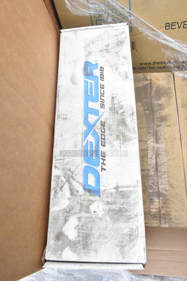Box with "Dexter The Edge Since 1818" logo, showing signs of wear. Contains scratch and dent items, including 19 units.