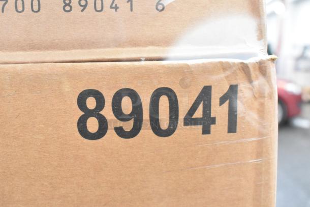 Cardboard box with visible number "89041," indicating Huhtamaki plastic round bowl flat lid. Box has slight dent.