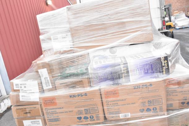 Pallet wrapped with 68 brand new items: Americare containers, WinCup lids, World Centric knives, digital timer, Cambro shelf.
