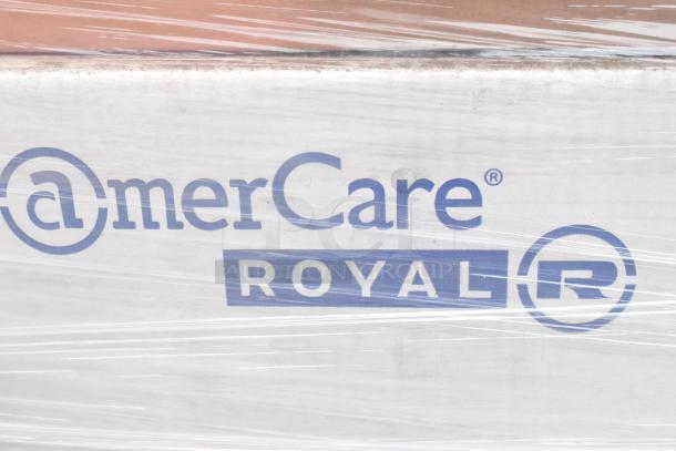 Box labeled "amerCare Royal" with protective wrap, indicating new condition. Contains scratch and dent items, including Americare 16oz containers and more.