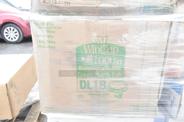 Sealed box of WinCup DL18 biodegradable green plastic lids. Box labeled for 12oz, 16oz, 20oz, 24oz use.