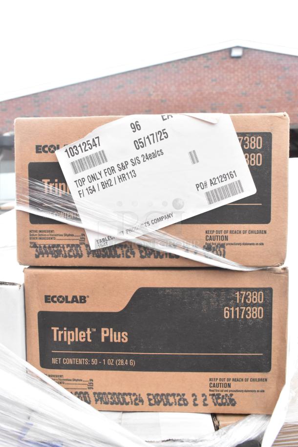 Boxes of Ecolab Triplet Plus, 50-1 oz, marked with product details and caution, included in a scratch and dent auction bundle.