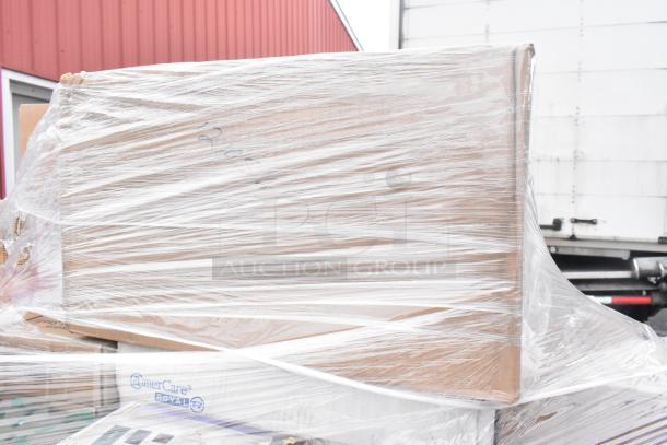 Pallet with new scratch-and-dent items wrapped in plastic, including Americare containers, WinCup lids, and World Centric knives.