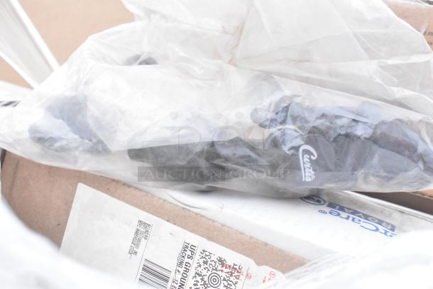 Bulk items in packaging, including brands like Americare and WinCup, new and scratch and dent condition.