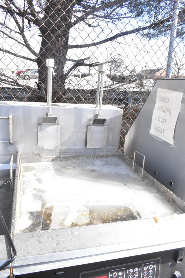 Giles EOF-24 stainless steel 3 bay fryer with EOF-BIB dumping station; 480V, 3 phase. Labels indicate pre-owned.