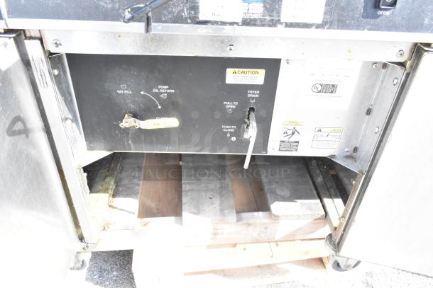 Giles EOF-24 electric 3-bay fryer, stainless steel, includes EOF-BIB dumping station, 480 volts, 3 phase, visible control labels.