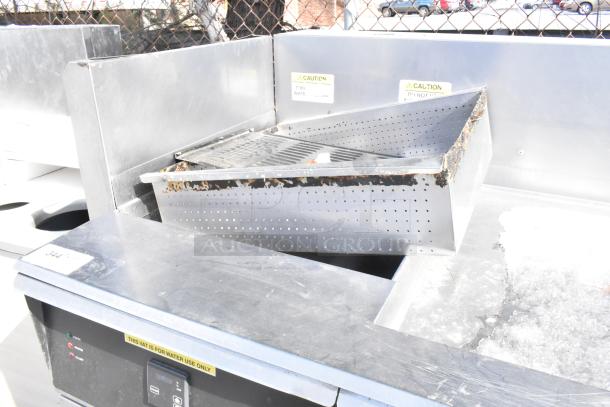 Giles EOF-24 stainless steel commercial electric 3-bay fryer with EOF-BIB dumping station, 480V, 3-phase, showing minor wear.