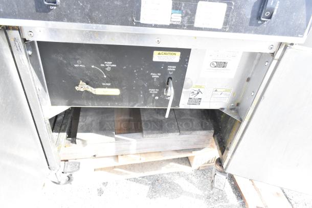 Giles EOF-24 stainless steel 3-bay fryer with EOF-BIB dumping station, 480V, 3-phase. Operational panel shows controls and caution labels.