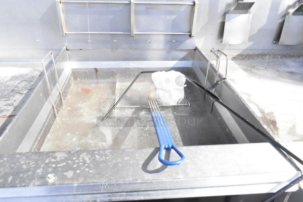 Giles EOF-24 stainless steel commercial electric 3 bay fryer with blue handle, 480V, 3 phase, includes EOF-BIB dumping station.