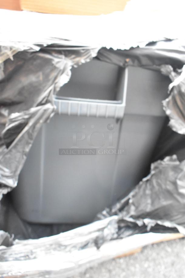 Auction lot of 34 new scratch and dent items including Rubbermaid container and American Metalcraft basket.