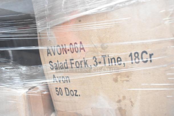 Cardboard box marked "AVON-06A Salad Fork, 3-Tine, 18Cr, Avon 50 Doz." wrapped in plastic, part of auction lot.