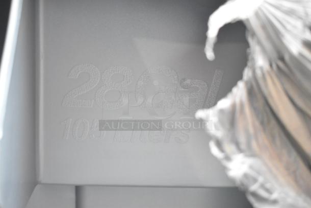 Close-up of the interior of a 28-gallon container, showing capacity markings of "28 Gal" and "105 Liters."