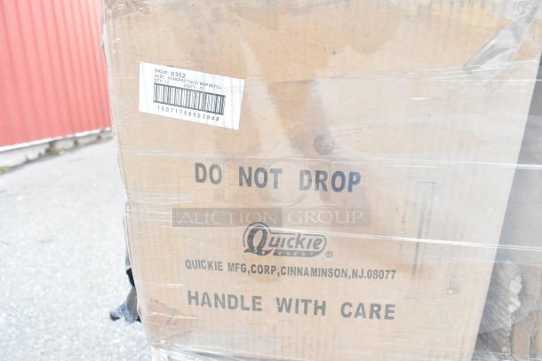 Cardboard box labeled "Do Not Drop," containing new scratch and dent items including Rubbermaid, American Metalcraft, and Libbey products. Tags indicate Quickie manufacturing.