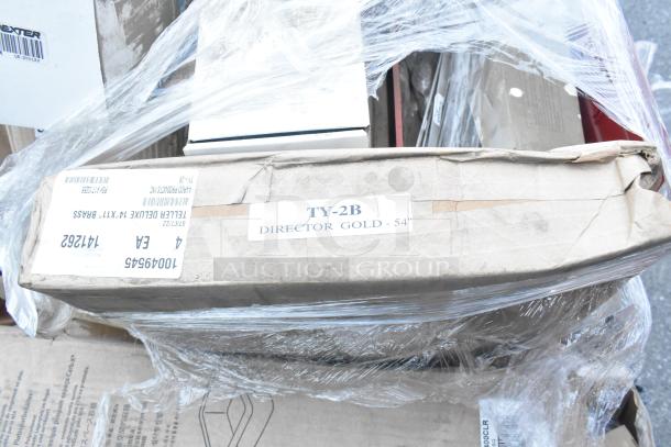 Stack of various items in packaging, including a Dexter Traditional Slicer box and labeled "TY-2B, Director Gold - 54.”