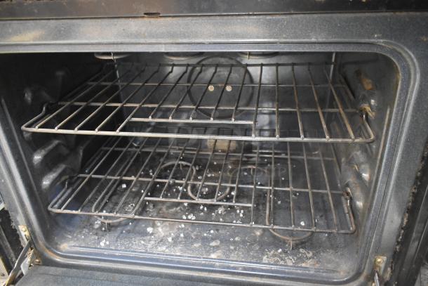 Kenmore 790.47873405 electric double wall convection oven, shows broken glass and interior condition. 120/208-240 volts.