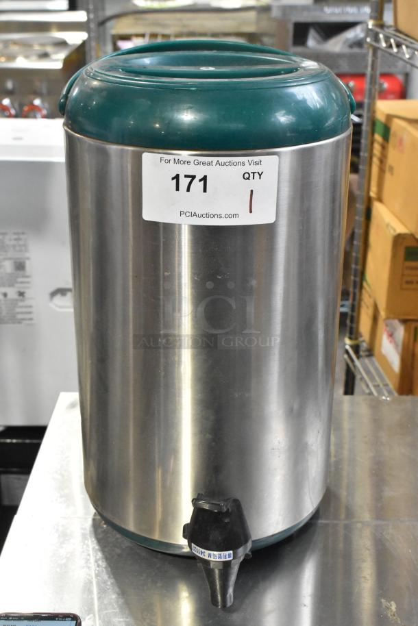 Stainless steel YM-1007 Beverage Dispenser with green lid and label. Durable condition, features a black spigot.