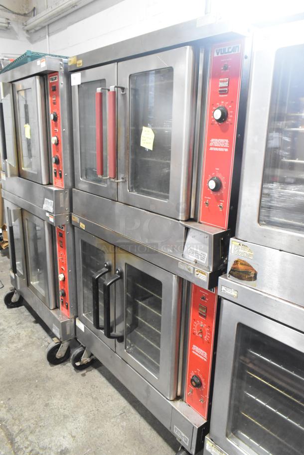 2 Vulcan VC4GD-10 commercial gas convection ovens with view-through doors, thermostatic controls, on commercial casters.