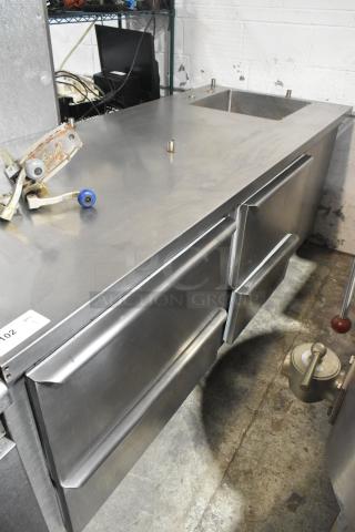 Commercial 4 Drawer Undercounter Cooler with Sink Bay, 115 Volts, 1 Phase, stainless steel, used condition.