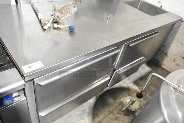 Commercial 4 Drawer Undercounter Cooler with Sink Bay; stainless steel, 115 volts, 1 phase, good condition.