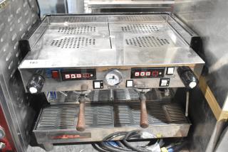 La Marzocco Linea 2-group stainless steel espresso machine, with 2 portafilters, 2 steam wands, and control panel. 208-240V, 1 phase.