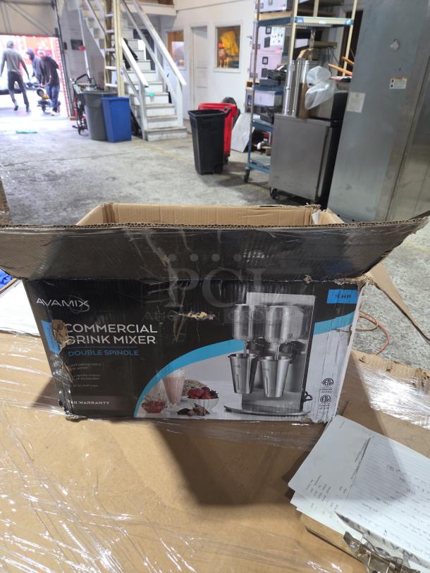 AvaMix conveyor unit box, model 928ADM2, brand new with scratch and dent, 115 volts, 1 phase, visible warehouse setting.