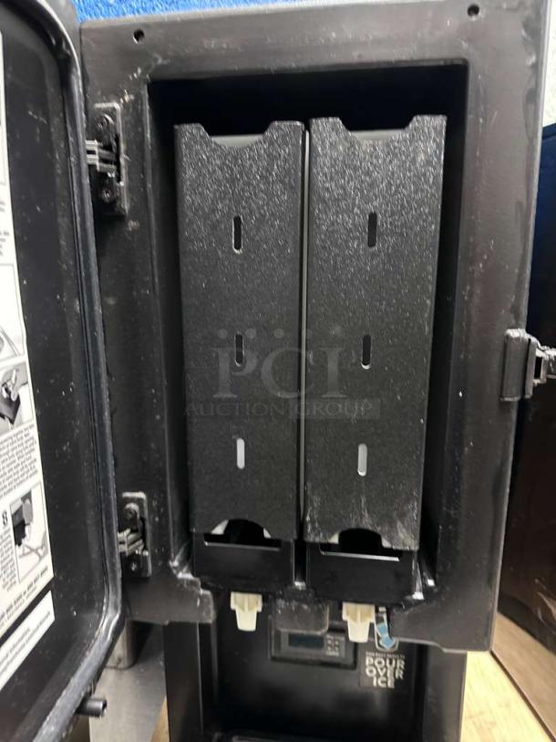 Outstanding condition STōK Cold Brew Coffee dispenser, model 230 by Creamiser Products, features dual compartments, 110V, fully tested.