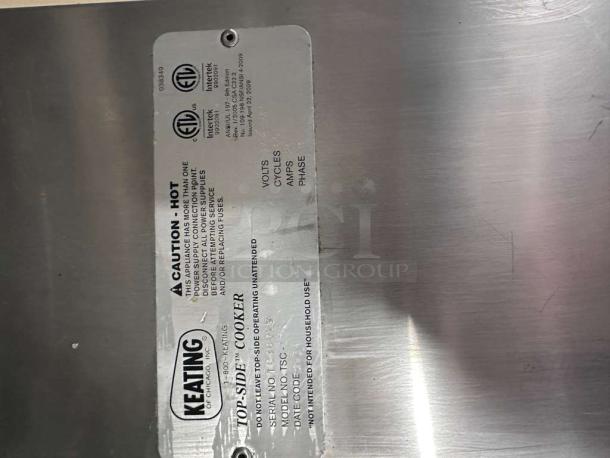 Keating Miraclean 36" gas griddle, exceptional condition, UL & NSF listed, caution labels, Keating brand marking visible.
