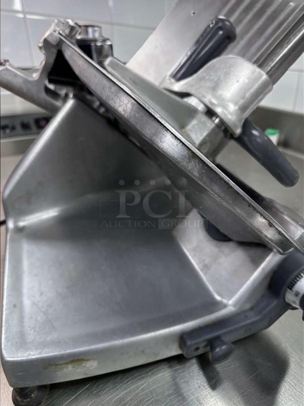 Hobart Commercial Manual Meat Slicer, NSF Listed, fully operational, in professional condition, made in USA, model HOB-L-MEAT-0518.
