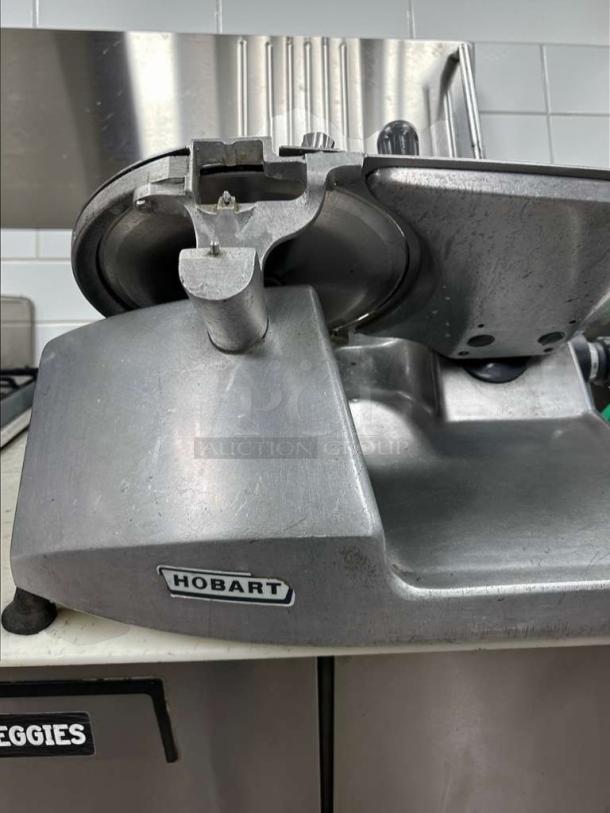 Hobart Commercial Manual Meat Slicer, fully tested, NSF listed, made in USA, professional condition, Hobart logo visible.