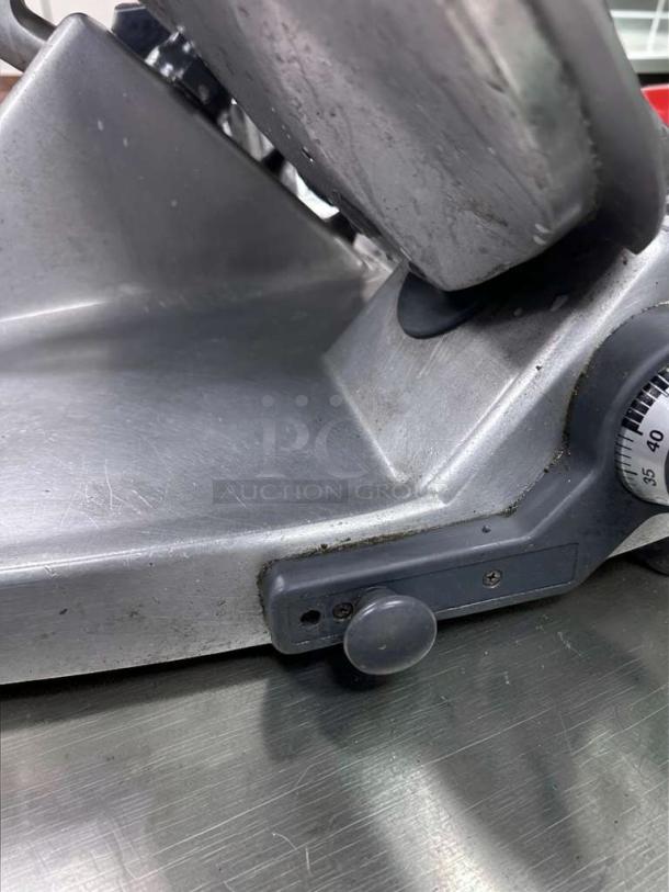 Hobart commercial manual meat slicer, NSF listed, metal construction, fully operational, made in USA, model HOB-L-MEAT-0518.