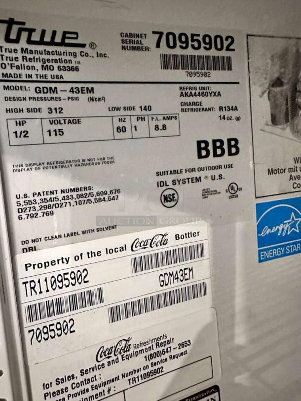 Label showing details of a True STM1R-2HS commercial refrigerator, including serial number 7095902, 115V voltage, and Energy Star certification.