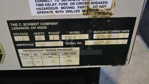 Label on C. Schmidt EHD-4 refrigerated deli display case, 115V, model from 1997. Serial: J02175-P; refrigerant details listed.