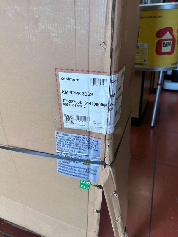 KoolMore 72" Refrigerated Prep Station, model KM-RBT-72C, brand new with visible scratches and dents on packaging.