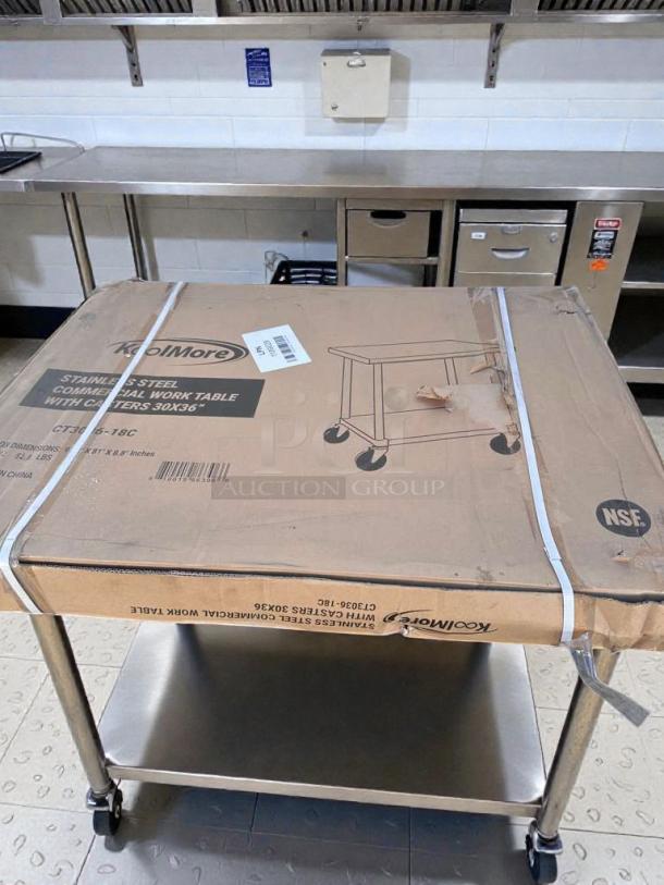 Brand new KoolMore CT3036-18C stainless steel work table with casters, 30"x36", NSF listed, in original packaging.