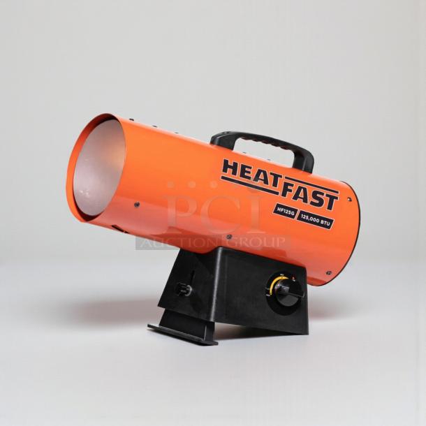 Brand new HeatFast HF125G propane heater, 125,000 BTU, portable, industrial, factory sealed, model number and logo visible.