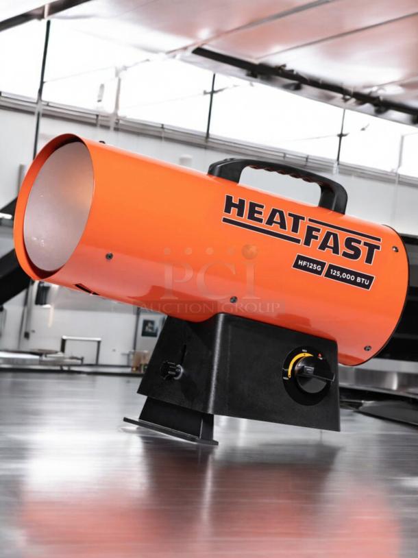 Brand new HeatFast HF125G propane heater, 125,000 BTU, factory sealed, portable, industrial use, 115V, orange housing.